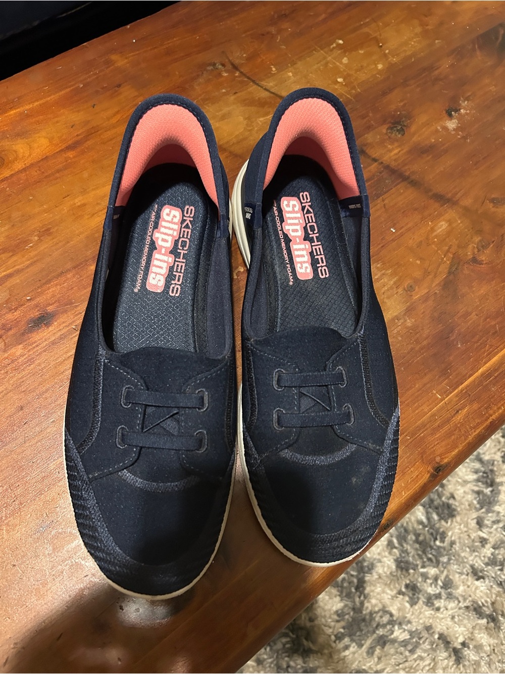 Skechers Women's Navy Slip-On Sneakers with Coral Lining